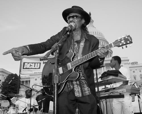 Chuck Brown “father of go-go” performing at a statehood rally.
