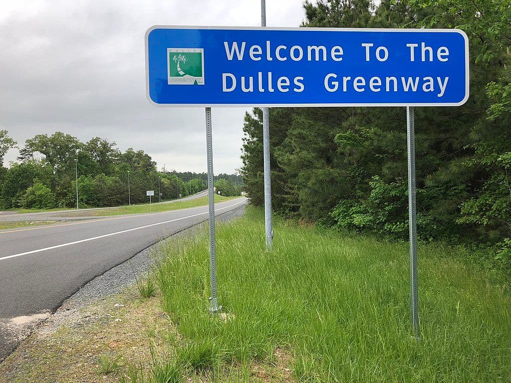 "Welcome to the Dulles Greenway" sign along the ramp from northbound Virginia State Route 28.
