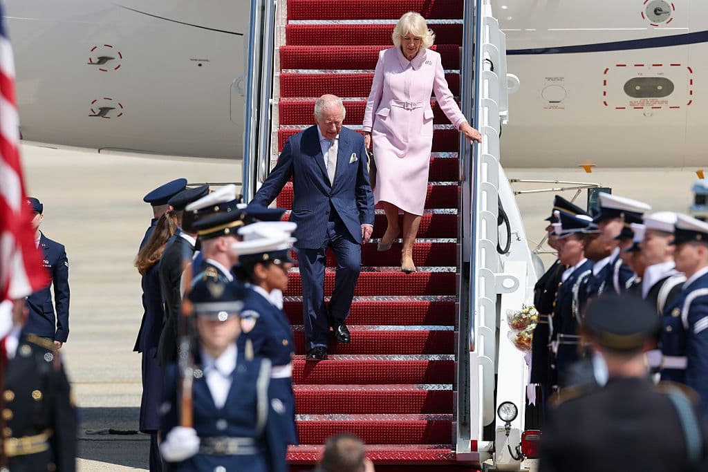 King Charles III and Queen Camilla disembark their plane as they arrive at Joint Base Andrews, Maryland. (Win McNamee/Getty Images)