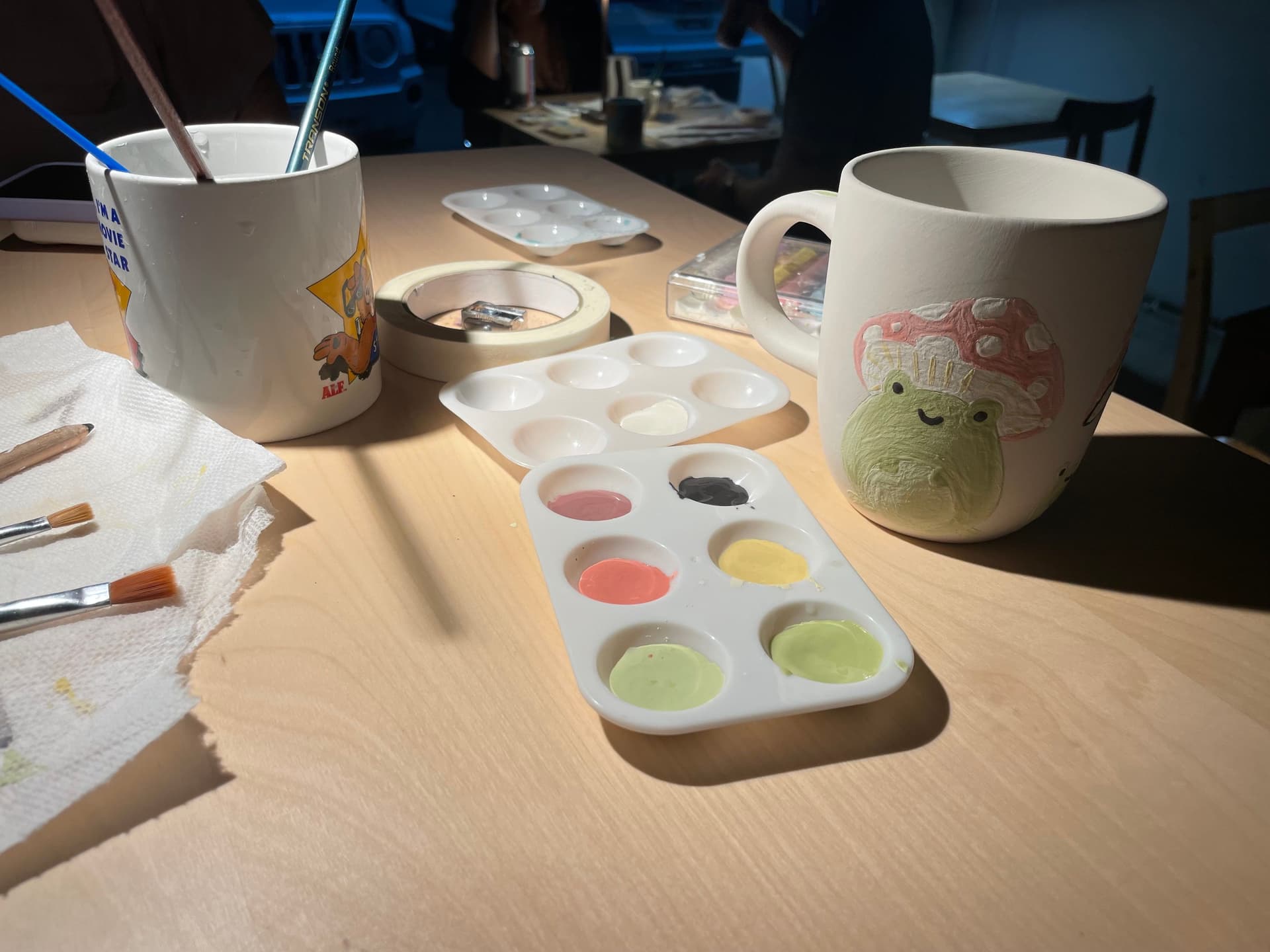 Painting a mug at The Art Room.