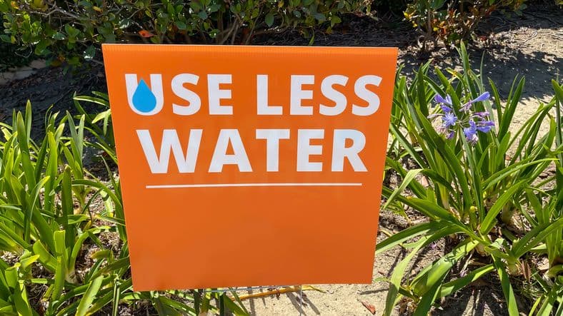 Conserve water sign